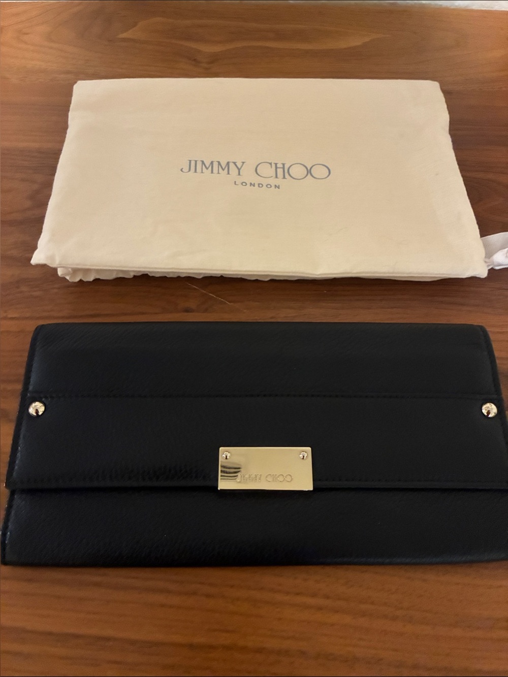 Jimmy Choo Black Leather Clutch with Gold Plate